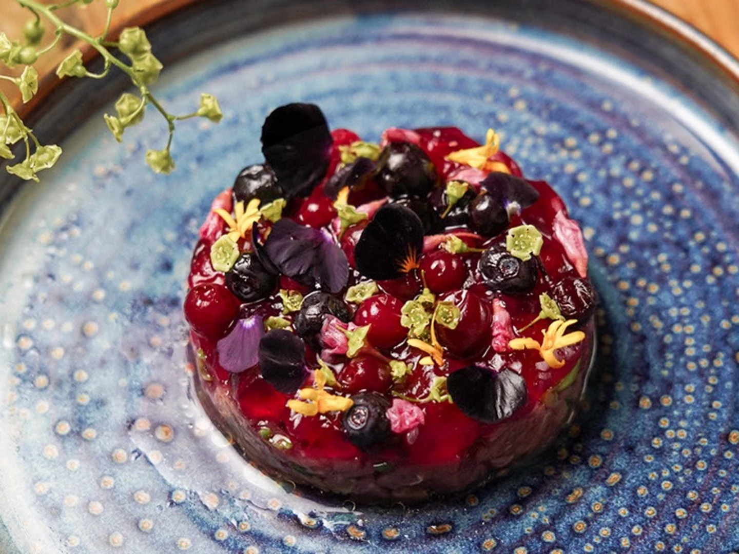 A vibrant chef-composed dish expressing Quintessencia’s ingredient-led, place-inspired dining philosophy.